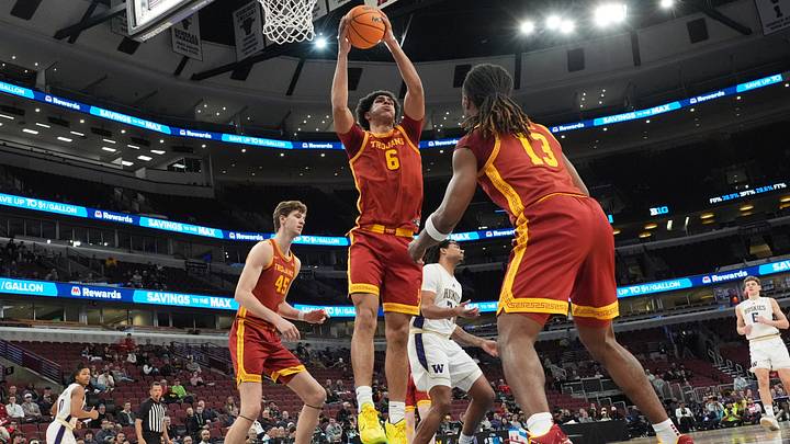 Mar 11, 2026; Chicago, IL, USA; Southern California Trojans forward Jacob Cofie (6) grabs a rebound against the Washington Huskies during the first half at United Center. Mandatory Credit: David Banks-Imagn Images