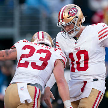 San Francisco 49ers quarterback Mac Jones (10) celebrates with San Francisco 49ers running back Christian McCaffrey (23) after scoring a touchdown during a week 9 game between New York Giants and San Francisco 49ers at MetLife Stadium on Sunday, Nov. 2, 2025.