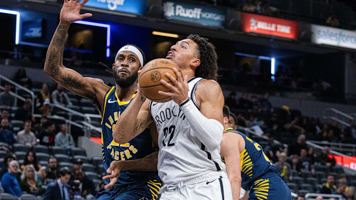 Apr 1, 2024; Indianapolis, Indiana, USA; Brooklyn Nets forward Jalen Wilson (22) shoots the ball while Indiana Pacers forward Isaiah Jackson (22) defends in the second half at Gainbridge Fieldhouse. Mandatory Credit: Trevor Ruszkowski-USA TODAY Sports