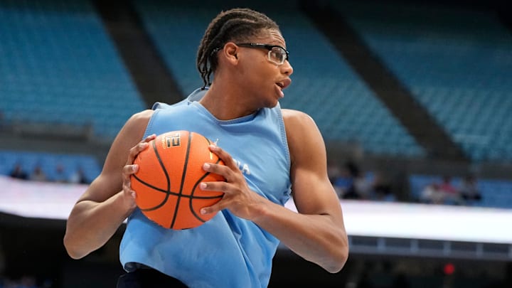 Oct 12, 2024; Chapel Hill, NC, USA; North Carolina Tar Heels forward James Brown (2) grabs a rebound in the second half at the Dean E. Smith Center. Mandatory Credit: Bob Donnan-Imagn Images