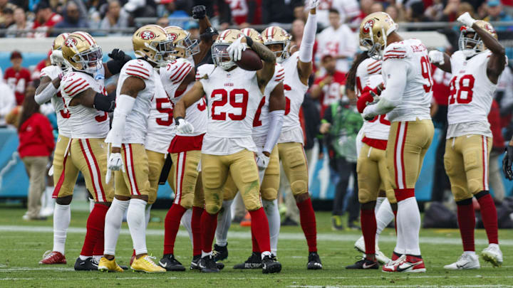 Nov 12, 2023; Jacksonville, Florida, USA; San Francisco 49ers safety Talanoa Hufanga (29) and teammates celebrate a fumble recovery during the third quarter at EverBank Stadium. Mandatory Credit: Morgan Tencza-Imagn Images