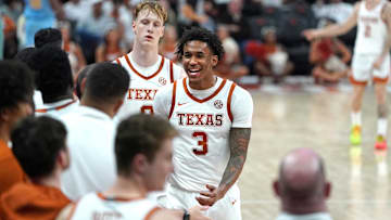 Texas Longhorns guard Dailyn Swain and center Matas Vokietaitis are congratulated at the bench during the second half against the Southern University Jaguars at Moody Center.