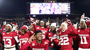 Nov 29, 2025; Norman, Oklahoma, USA;  Oklahoma Sooners players celebrate after the game against the Louisiana State Tigers at Gaylord Family-Oklahoma Memorial Stadium. Mandatory Credit: Kevin Jairaj-Imagn Images