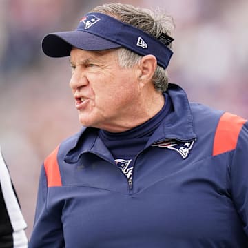 Jan 1, 2023; Foxborough, Massachusetts, USA; New England Patriots head coach Bill Belichick watches from the sideline as they take on the Miami Dolphins at Gillette Stadium.