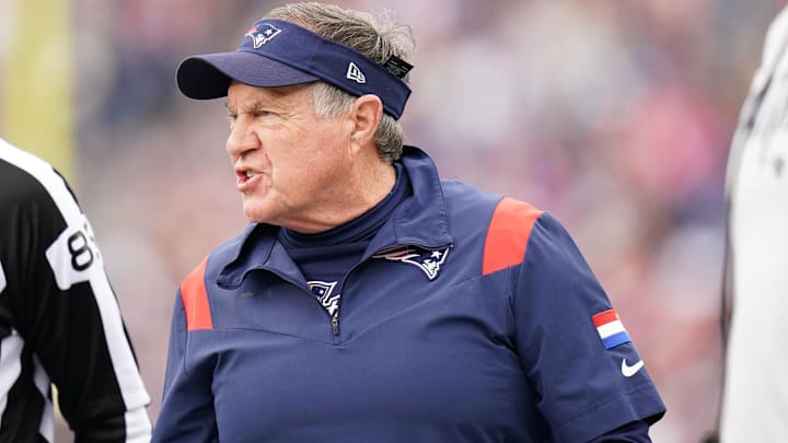 Jan 1, 2023; Foxborough, Massachusetts, USA; New England Patriots head coach Bill Belichick watches from the sideline as they take on the Miami Dolphins at Gillette Stadium.