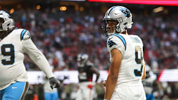 Nov 16, 2025; Atlanta, Georgia, USA; Carolina Panthers quarterback Bryce Young (9) reacts to a touchdown in the fourth quarter against the Atlanta Falcons at Mercedes-Benz Stadium. Mandatory Credit: Brett Davis-Imagn Images