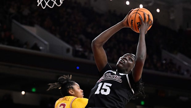 Mississippi State Bulldogs center Madina Okot grabs a rebound