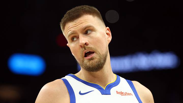 Apr 17, 2026; Phoenix, Arizona, USA; Golden State Warriors center Kristaps Porzingis (7) against the Phoenix Suns during the play-in rounds of the 2026 NBA Playoffs at Mortgage Matchup Center. Mandatory Credit: Mark J. Rebilas-Imagn Images
