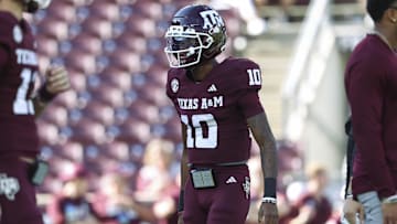 Nov 15, 2025; College Station, Texas, USA; Texas A&M Aggies quarterback Marcel Reed (10) warms up before the game against the South Carolina Gamecocks at Kyle Field. Mandatory Credit: Troy Taormina-Imagn Images