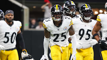 Sep 8, 2024; Atlanta, Georgia, USA; Pittsburgh Steelers safety DeShon Elliott (25) celebrates with teammates after an interception against the Atlanta Falcons in the first quarter at Mercedes-Benz Stadium. Mandatory Credit: Brett Davis-Imagn Images