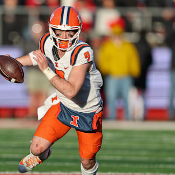 Nov 23, 2024; Piscataway, New Jersey, USA; Illinois Fighting Illini quarterback Luke Altmyer (9) scrambles during the second half against the Rutgers Scarlet Knights at SHI Stadium. Mandatory Credit: Vincent Carchietta-Imagn Images