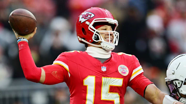 Dec 15, 2024; Cleveland, Ohio, USA; Cleveland Browns defensive tackle Mike Hall Jr. (51) and linebacker Devin Bush (30) rush Kansas City Chiefs quarterback Patrick Mahomes (15) during the second half at Huntington Bank Field. Mandatory Credit: Ken Blaze-Imagn Images