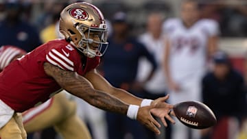 San Francisco 49ers quarterback Trey Lance (5) tosses the ball during the third quarter against the Denver Broncos at Levi's Stadium.