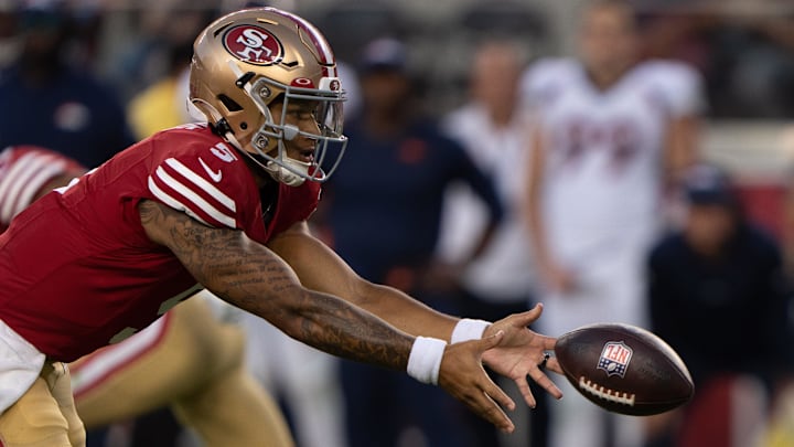 San Francisco 49ers quarterback Trey Lance (5) tosses the ball during the third quarter against the Denver Broncos at Levi's Stadium.