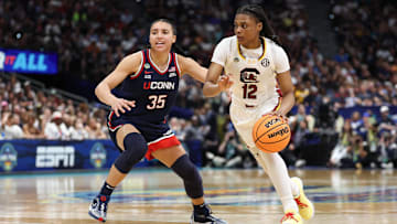 Apr 6, 2025; Tampa, FL, USA; Connecticut Huskies guard Azzi Fudd (35) defends against South Carolina Gamecocks guard MiLaysia Fulwiley (12) during the second half of the national championship of the women's 2025 NCAA tournament at Amalie Arena. Mandatory Credit: Nathan Ray Seebeck-Imagn Images