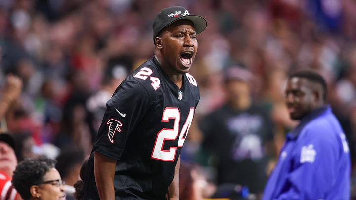 Sep 17, 2023; Atlanta, Georgia, USA; An Atlanta Falcons fan cheers against the Green Bay Packers in the second half at Mercedes-Benz Stadium. Mandatory Credit: Brett Davis-Imagn Images