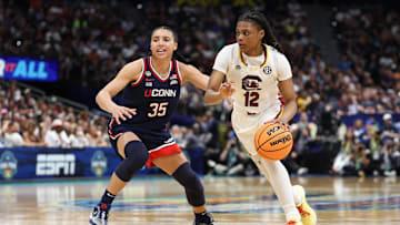 Apr 6, 2025; Tampa, FL, USA; Connecticut Huskies guard Azzi Fudd (35) defends against South Carolina Gamecocks guard MiLaysia Fulwiley (12) during the second half of the national championship of the women's 2025 NCAA tournament at Amalie Arena. Mandatory Credit: Nathan Ray Seebeck-Imagn Images
