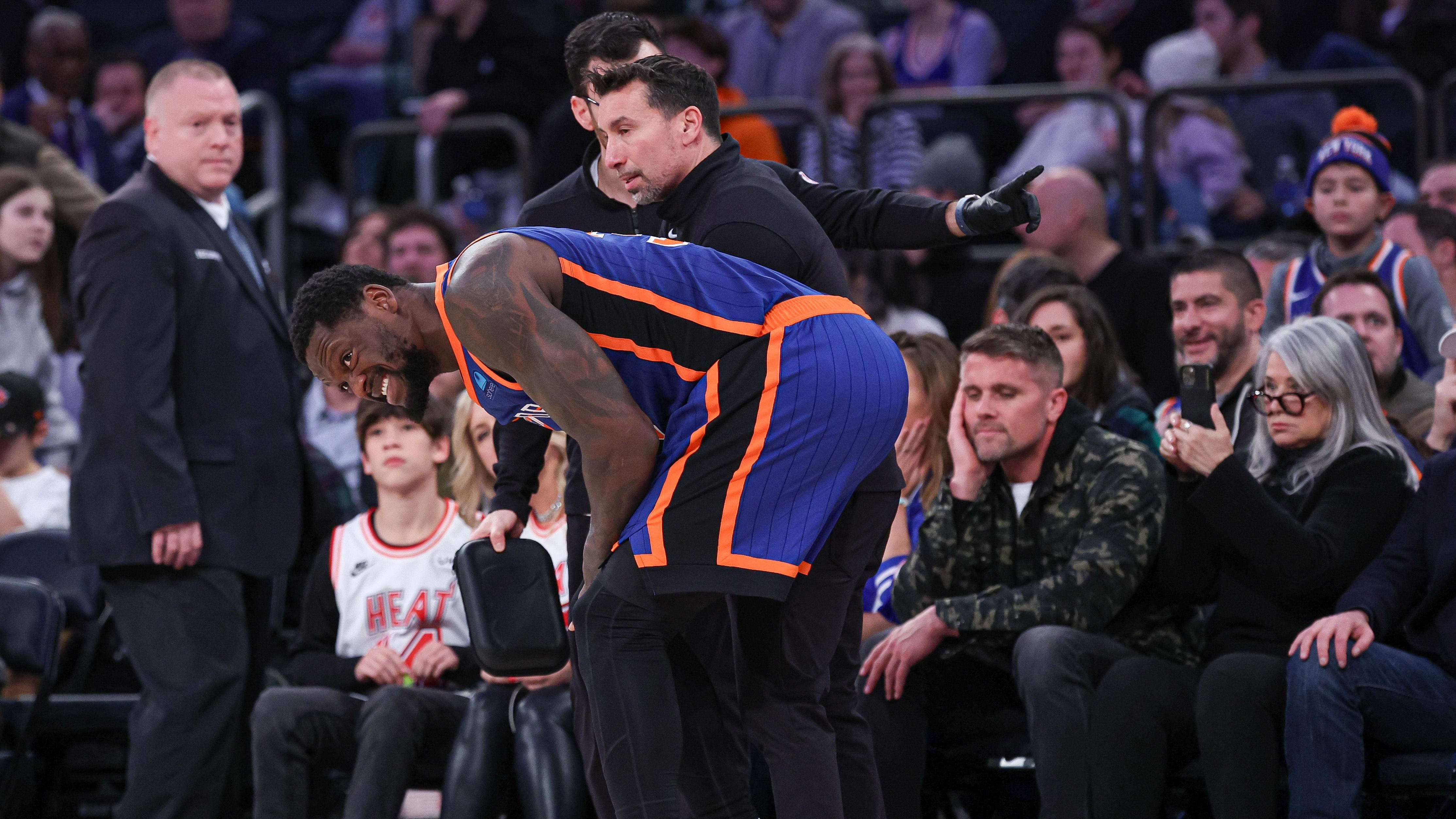 Jan 27, 2024; New York, New York, USA; New York Knicks forward Julius Randle (30) is helped by