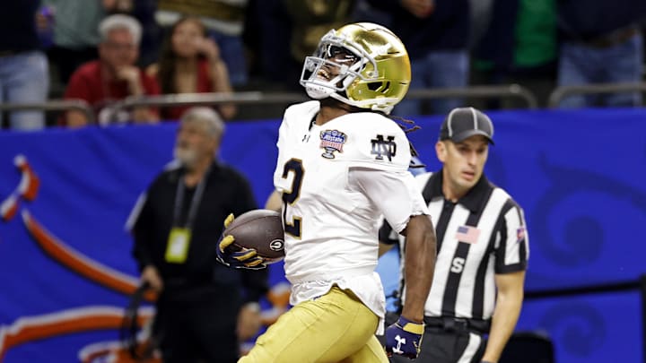 Notre Dame wide receiver Jayden Harrison scores a 98-yard kickoff return touchdown against Georgia in the Sugar Bowl.