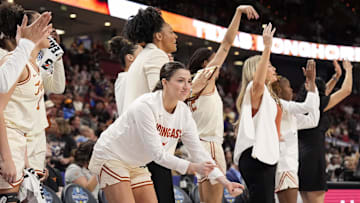 Mar 8, 2025; Greenville, SC, USA; Texas Longhorns bench celebrates during the second half against the LSU Lady Tigers at Bon Secours Wellness Arena. Mandatory Credit: Jim Dedmon-Imagn Images