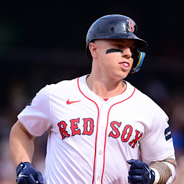 Boston Red Sox left fielder Tyler O'Neill (17) runs the bases after hitting a home run during the ninth inning against the Arizona Diamondbacks at Fenway Park on Aug 25.