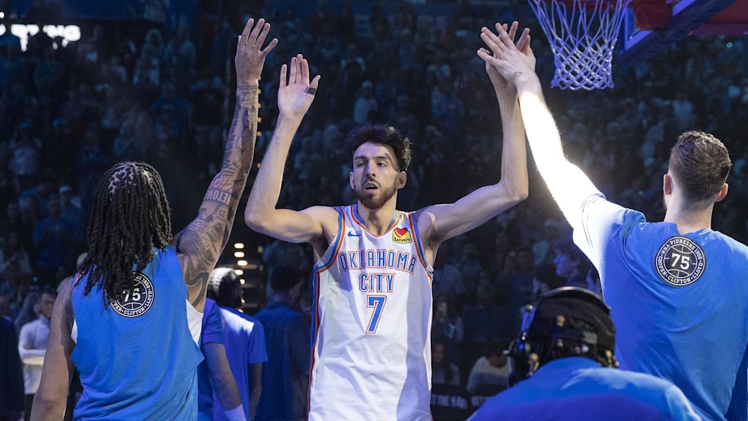 Feb 7, 2026; Oklahoma City, Oklahoma, USA; Oklahoma City Thunder center/forward Chet Holmgren (7) high fives his team before the start of a game against the Houston Rockets at Paycom Center. Mandatory Credit: Alonzo Adams-Imagn Images