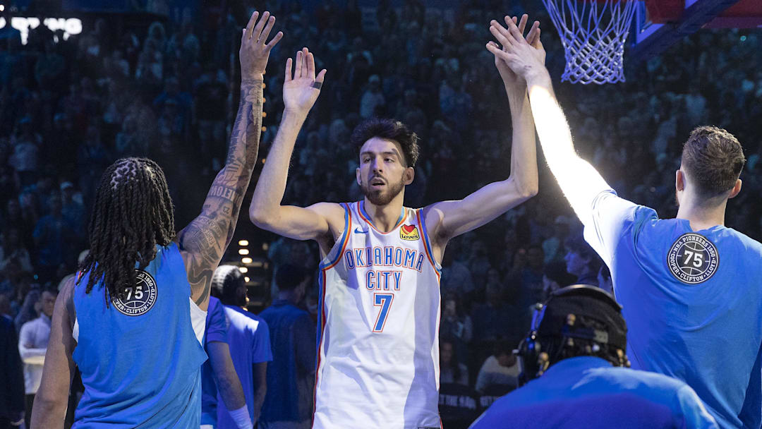 Feb 7, 2026; Oklahoma City, Oklahoma, USA; Oklahoma City Thunder center/forward Chet Holmgren (7) high-fives his team before the start of a game against the Houston Rockets at Paycom Center. Mandatory Credit: Alonzo Adams-Imagn Images