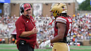 Aug 30, 2025; Chestnut Hill, Massachusetts, USA; Boston College Eagles head coach Bill O'Brien congratulates running back Turbo Richard (2) on his touchdown against the Fordham Rams during the second half at Alumni Stadium. Mandatory Credit: Eric Canha-Imagn Images