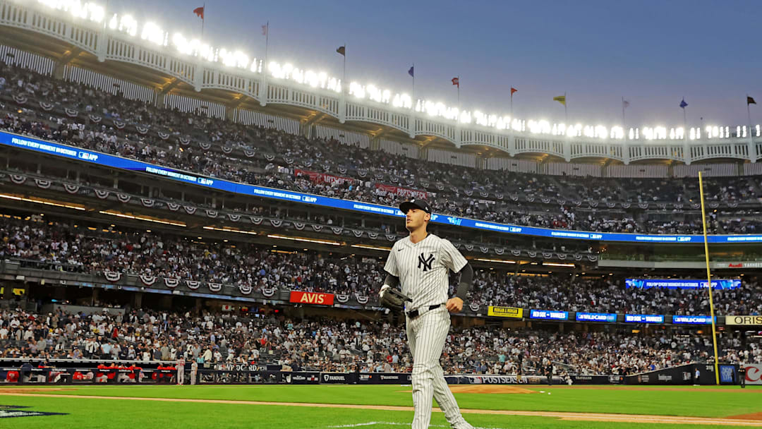 Sep 30, 2025; Bronx, New York, USA; New York Yankees outfielder Cody Bellinger (35) runs in after the top of third inning against the Boston Red Sox during game one of the Wildcard round for the 2025 MLB playoffs at Yankee Stadium. Mandatory Credit: Brad Penner-Imagn Images Sep 30, 2025; Bronx, New York, USA; New York Yankees outfielder Cody Bellinger (35) runs in after the top of third inning against the Boston Red Sox during game one of the Wildcard round for the 2025 MLB playoffs at Yankee Stadium. Mandatory Credit: Brad Penner-Imagn Images