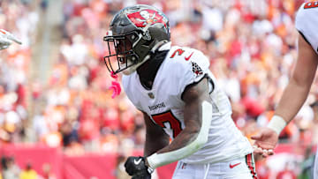 Sep 22, 2024; Tampa, Florida, USA; Tampa Bay Buccaneers running back Bucky Irving (7) celebrates during the first half against the Denver Broncos at Raymond James Stadium. Mandatory Credit: Kim Klement Neitzel-Imagn Images