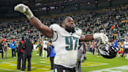 Nov 10, 2025; Green Bay, Wisconsin, USA;  Philadelphia Eagles defensive tackle Moro Ojomo (97) celebrates following the game against the Green Bay Packers at Lambeau Field. Mandatory Credit: Jeff Hanisch-Imagn Images
