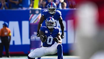New York Giants linebacker Brian Burns (0) and New York Giants cornerback Dee Williams (33) celebrate during a game against the Los Angeles Chargers at MetLife Stadium, Sep 28, 2025, East Rutherford, NJ, USA.