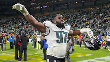 Nov 10, 2025; Green Bay, Wisconsin, USA;  Philadelphia Eagles defensive tackle Moro Ojomo (97) celebrates following the game against the Green Bay Packers at Lambeau Field. Mandatory Credit: Jeff Hanisch-Imagn Images