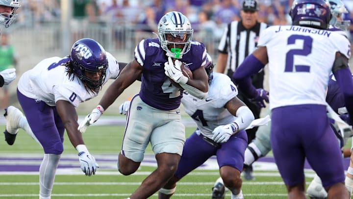 Oct 11, 2025; Manhattan, Kansas, USA; Kansas State Wildcats running back Joe Jackson (4) finds room to run during the fourth quarter against the TCU Horned Frogs at Bill Snyder Family Football Stadium. 