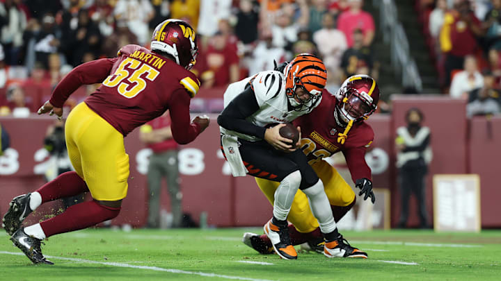 Burrow looked sharp but took two sacks in Monday night's tuneup. Burrow looked sharp but took two sacks in Monday night's tuneup.