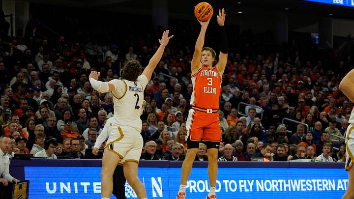 Dec 6, 2024; Evanston, Illinois, USA; Illinois Fighting Illini forward Ben Humrichous (3) shoots over Northwestern Wildcats forward Nick Martinelli (2) during the first half at Welsh-Ryan Arena. Mandatory Credit: David Banks-Imagn Images