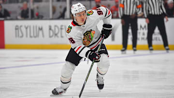 Mar 1, 2025; Anaheim, California, USA; Chicago Blackhawks center Connor Bedard (98) controls the puck against the Anaheim Ducks during the third period at Honda Center. Mandatory Credit: Gary A. Vasquez-Imagn Images