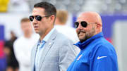 Aug 26, 2023; East Rutherford, New Jersey, USA; New York Giants head coach Brian Daboll (right) and general manager Joe Schoen (left) talk before a game against the New York Jets at MetLife Stadium.  