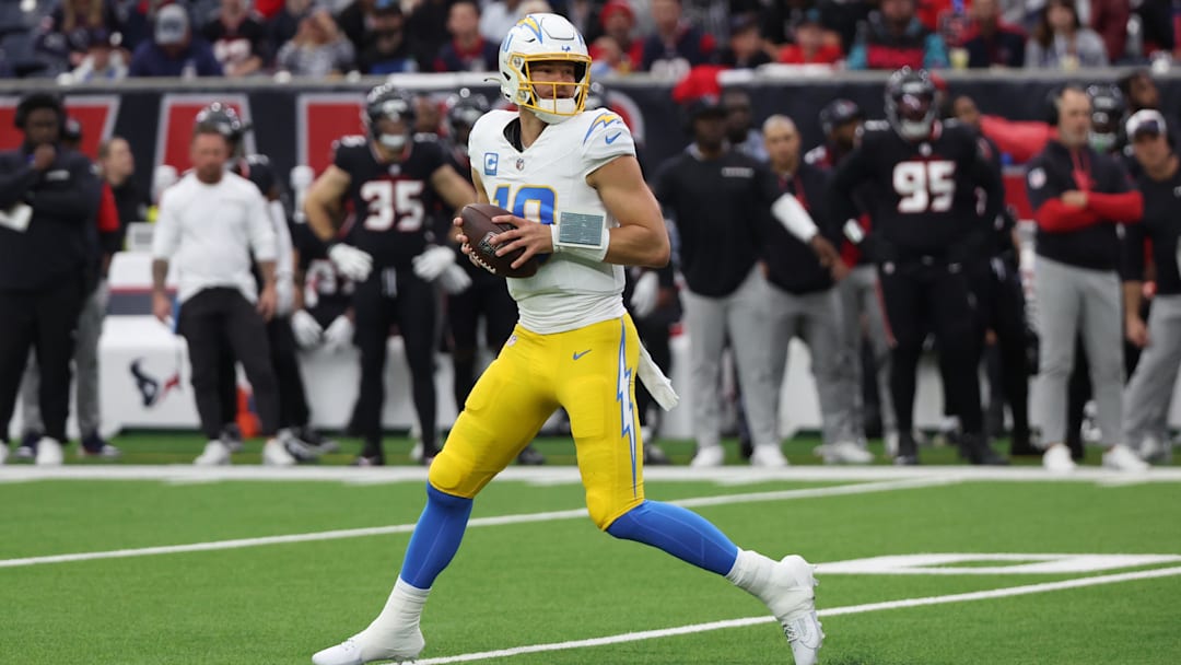 Los Angeles Chargers QB Justin Herbert drops back in the pocket in the first quarter against the Houston Texans. Los Angeles Chargers QB Justin Herbert drops back in the pocket in the first quarter against the Houston Texans.