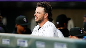 Apr 9, 2025; Denver, Colorado, USA; Colorado Rockies designated hitter Kris Bryant (23) looks on from the dugout before the game against the Milwaukee Brewers at Coors Field. Mandatory Credit: Isaiah J. Downing-Imagn Images