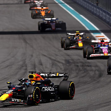 May 4, 2024; Miami Gardens, Florida, USA; Red Bull Racing driver Max Verstappen (1) lead the field into turn one during the F1 Sprint Race at Miami International Autodrome. Mandatory Credit: Peter Casey-Imagn Images