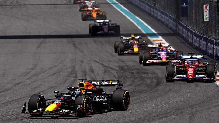 May 4, 2024; Miami Gardens, Florida, USA; Red Bull Racing driver Max Verstappen (1) lead the field into turn one during the F1 Sprint Race at Miami International Autodrome. Mandatory Credit: Peter Casey-Imagn Images