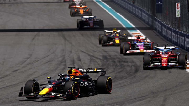 May 4, 2024; Miami Gardens, Florida, USA; Red Bull Racing driver Max Verstappen (1) lead the field into turn one during the F1 Sprint Race at Miami International Autodrome. Mandatory Credit: Peter Casey-USA TODAY Sports