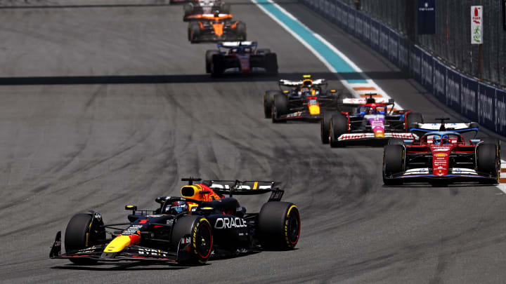 May 4, 2024; Miami Gardens, Florida, USA; Red Bull Racing driver Max Verstappen (1) lead the field into turn one during the F1 Sprint Race at Miami International Autodrome. Mandatory Credit: Peter Casey-USA TODAY Sports