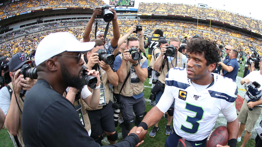 Sep 15, 2019; Pittsburgh, PA, USA;  Pittsburgh Steelers head coach Mike Tomlin (left) and Seattle Seahwks quarterback Russell Wilson