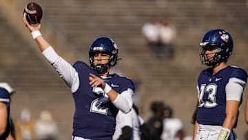 Oct 19, 2024; East Hartford, Connecticut, USA; Connecticut Huskies quarterback Joe Fagnano (2) warms up before the start of the game against the Wake Forest Demon Deacons at Rentschler Field at Pratt & Whitney Stadium. Mandatory Credit: David Butler II-Imagn Images