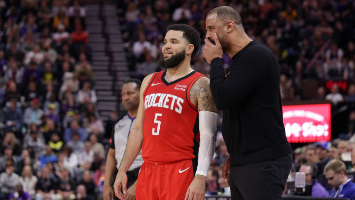 Mar 29, 2024; Salt Lake City, Utah, USA;  Houston Rockets guard Fred VanVleet (5) and Houston Rockets head coach Ime Udoka talk during the second half against the Utah Jazz at Delta Center. Mandatory Credit: Chris Nicoll-USA TODAY Sports