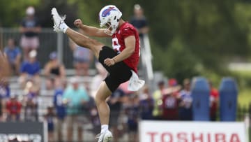 Matt Araiza booms a punt during Buffalo Bills training camp two years ago. Araiza was waived by Buffalo during training camp after winning the punting job, when his name arose in a sex scandal. 