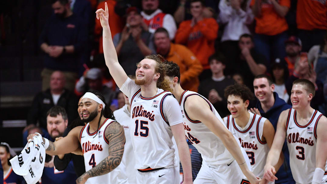 Mar 3, 2026; Champaign, Illinois, USA; Illinois Fighting Illini players celebrate their 80-54 win against the Oregon Ducks  during the second half at State Farm Center. Mandatory Credit: Ron Johnson-Imagn Images