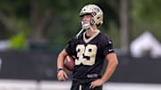 Jun 10, 2025; New Orleans, LA, USA;  New Orleans Saints place kicker Charlie Smyth (39) looks on during minicamp at Ochsner Sports Performance Center. Mandatory Credit: Stephen Lew-Imagn Images
